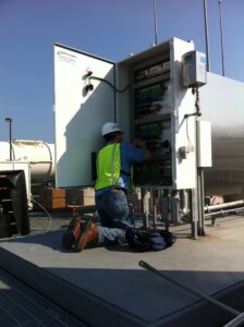 CCT Engineer Servicing Pad Side Controller