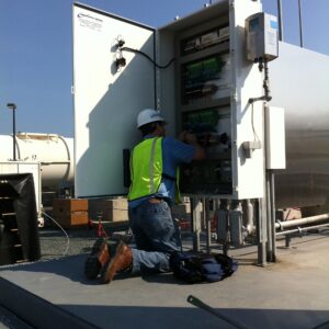 CCT Engineer Servicing Pad Side Controller